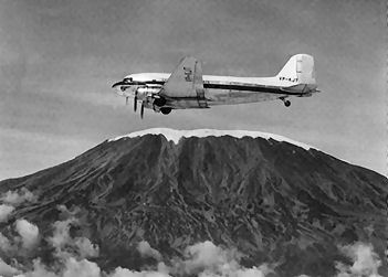 A classic picture of an East African Airways DC-3 passing Mount Kilimanjaro in East Africa